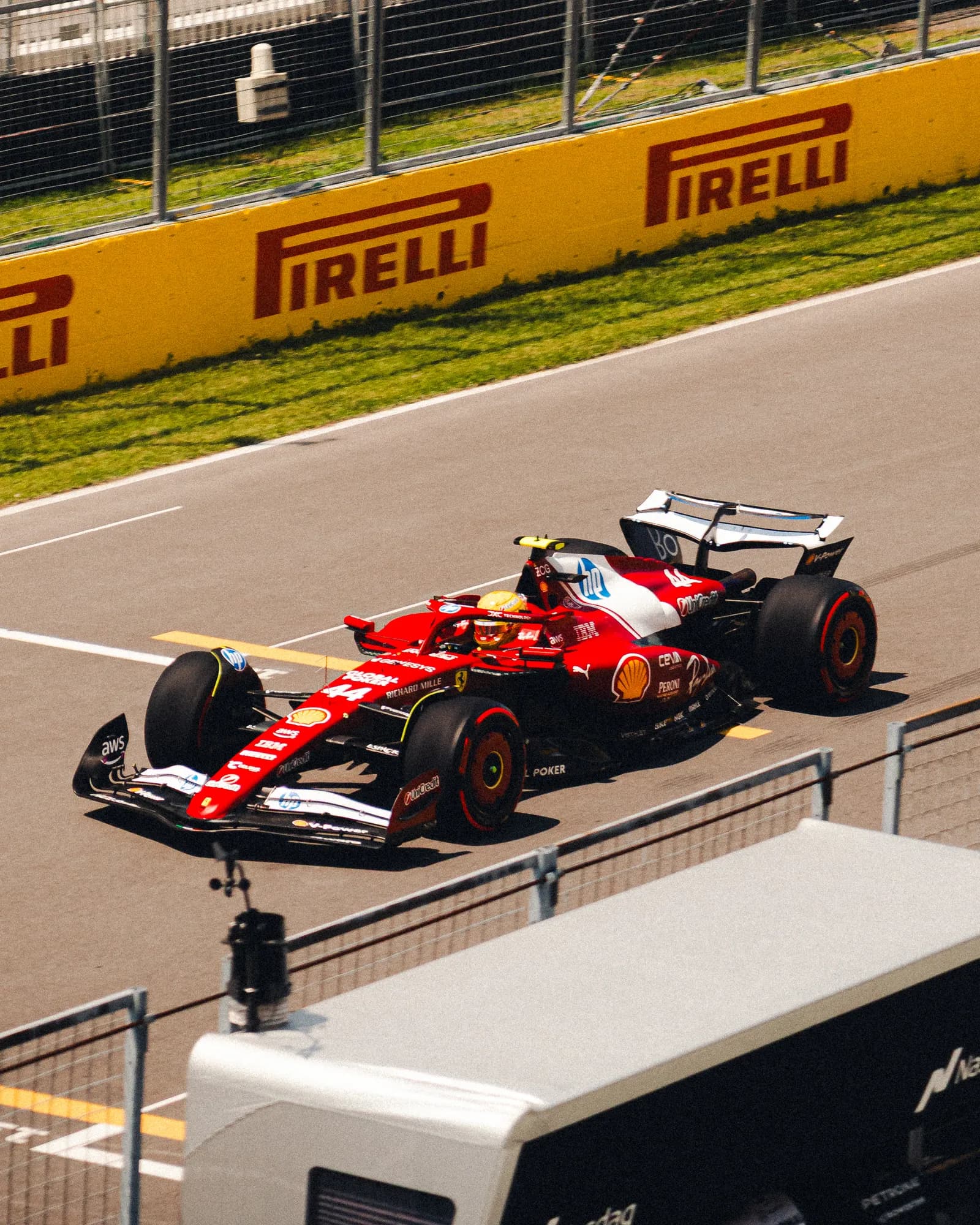 Ferrari on track past the Pirelli boards