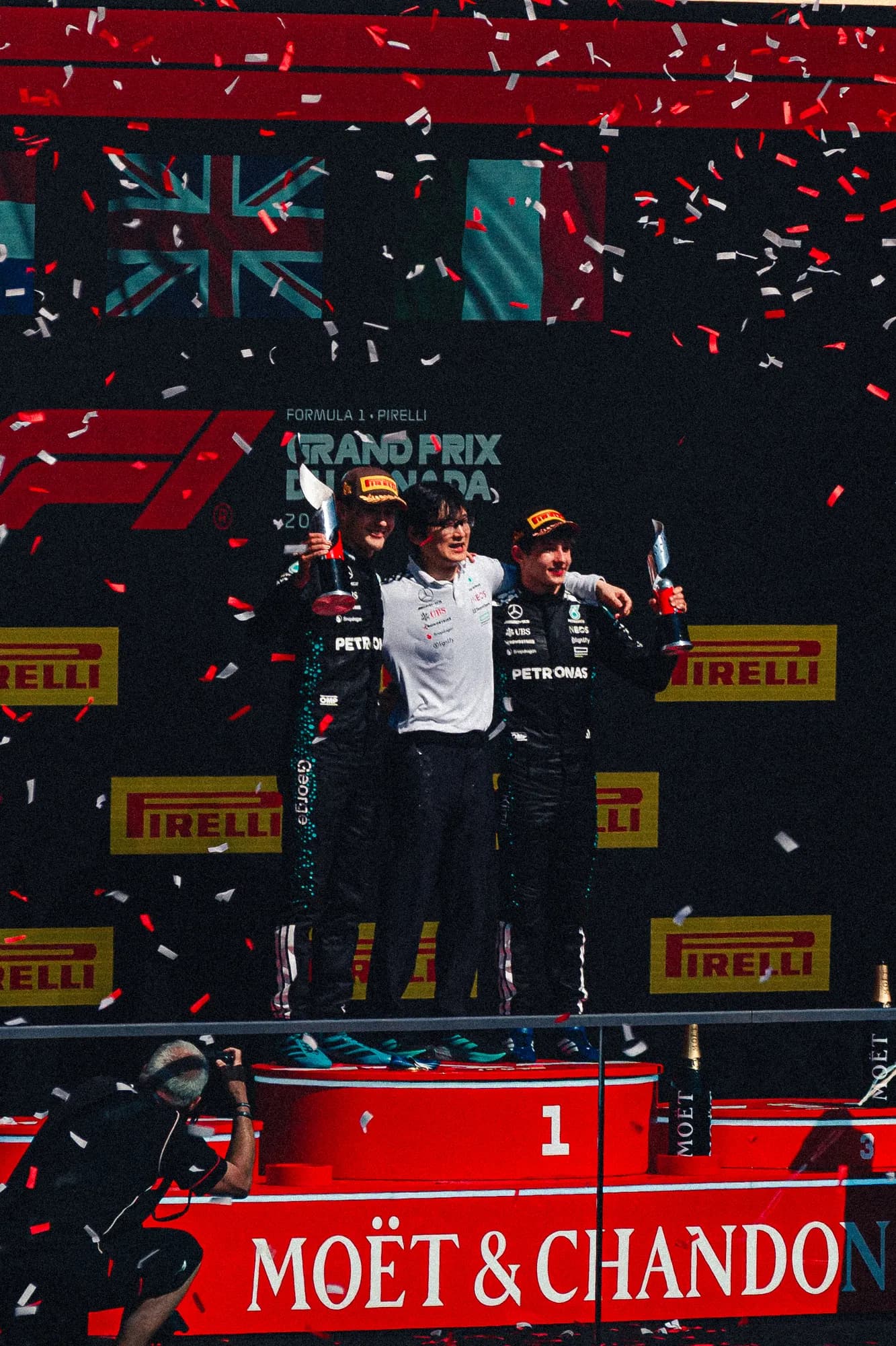 Confetti falling over the Mercedes drivers on the podium